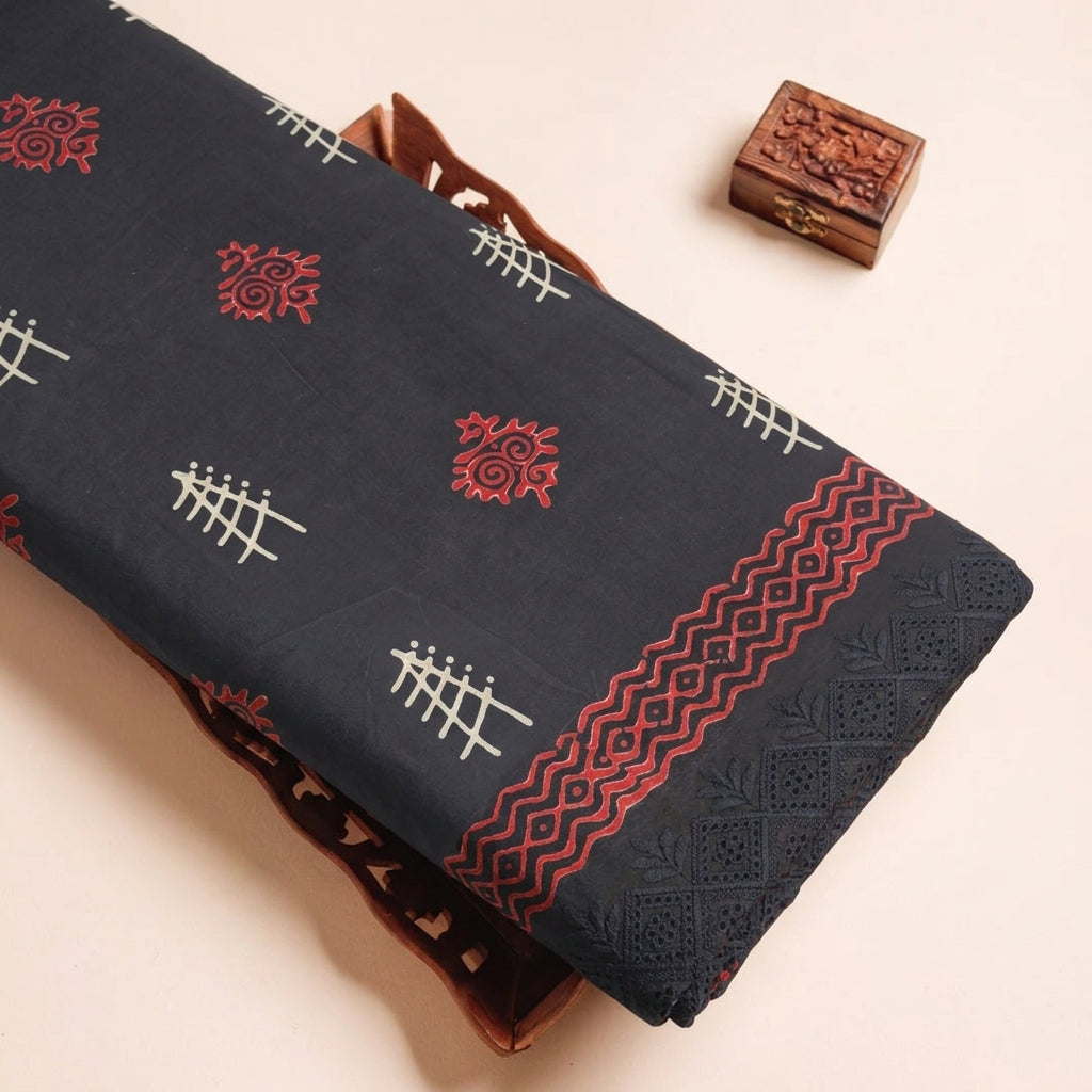Cutwork Black Cutwork Cotton Fabric on a wooden tray