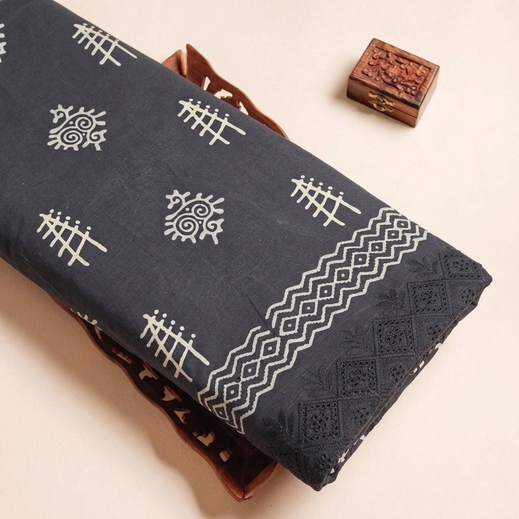 Cutwork Black Cutwork Cotton Fabric on a wooden tray