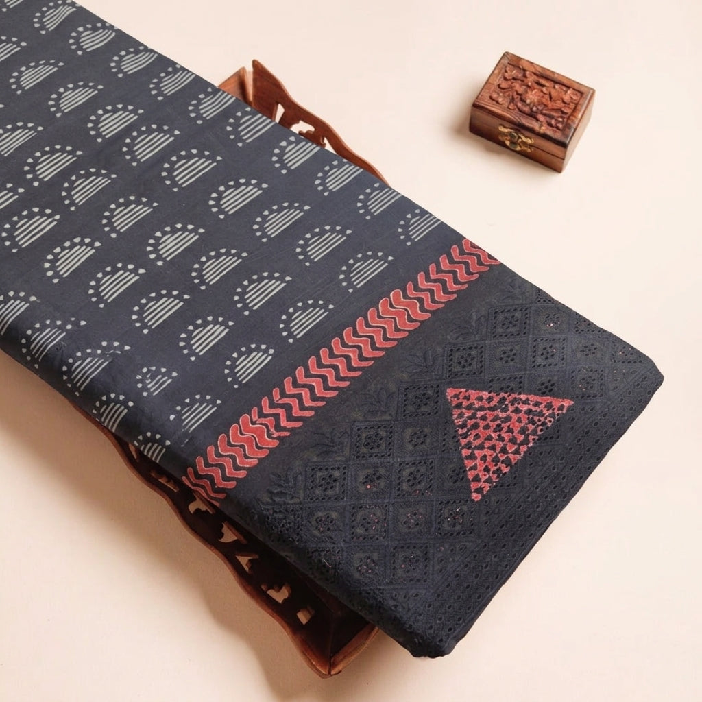 Cutwork Black Cutwork Cotton Fabric on a wooden tray