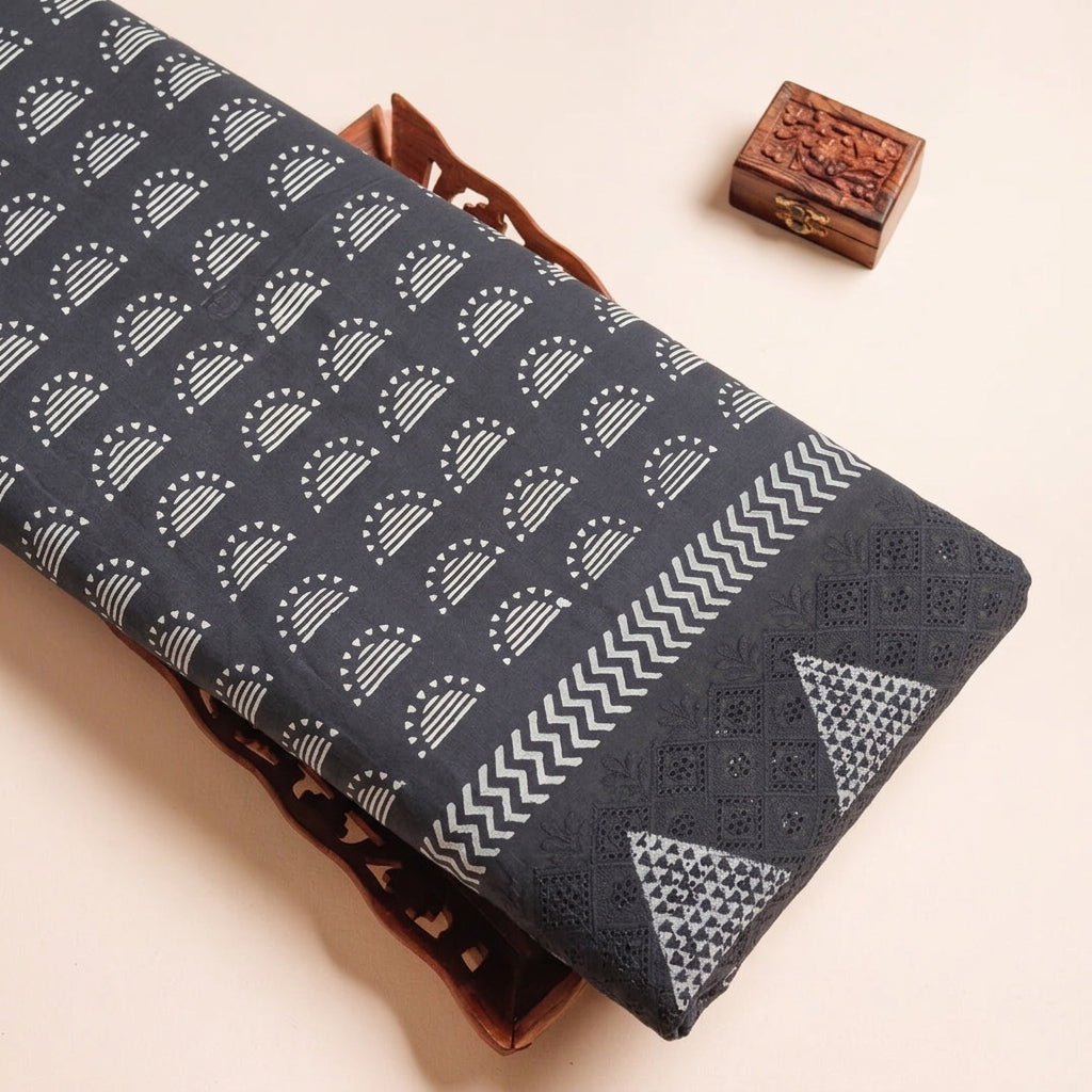 Cutwork Black Cutwork Cotton Fabric on a wooden tray