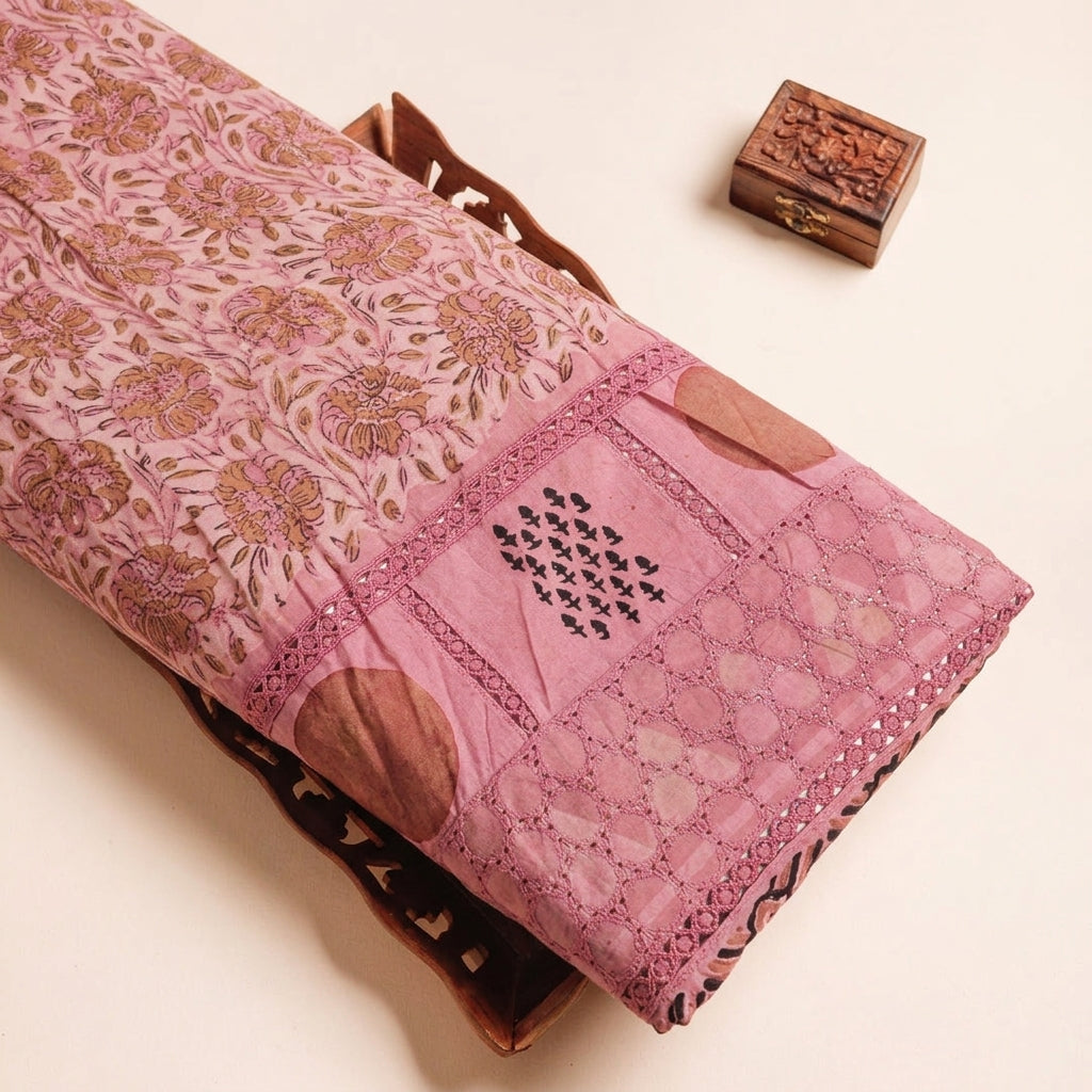 Cutwork Pink Cutwork Cotton Fabric on a wooden tray
