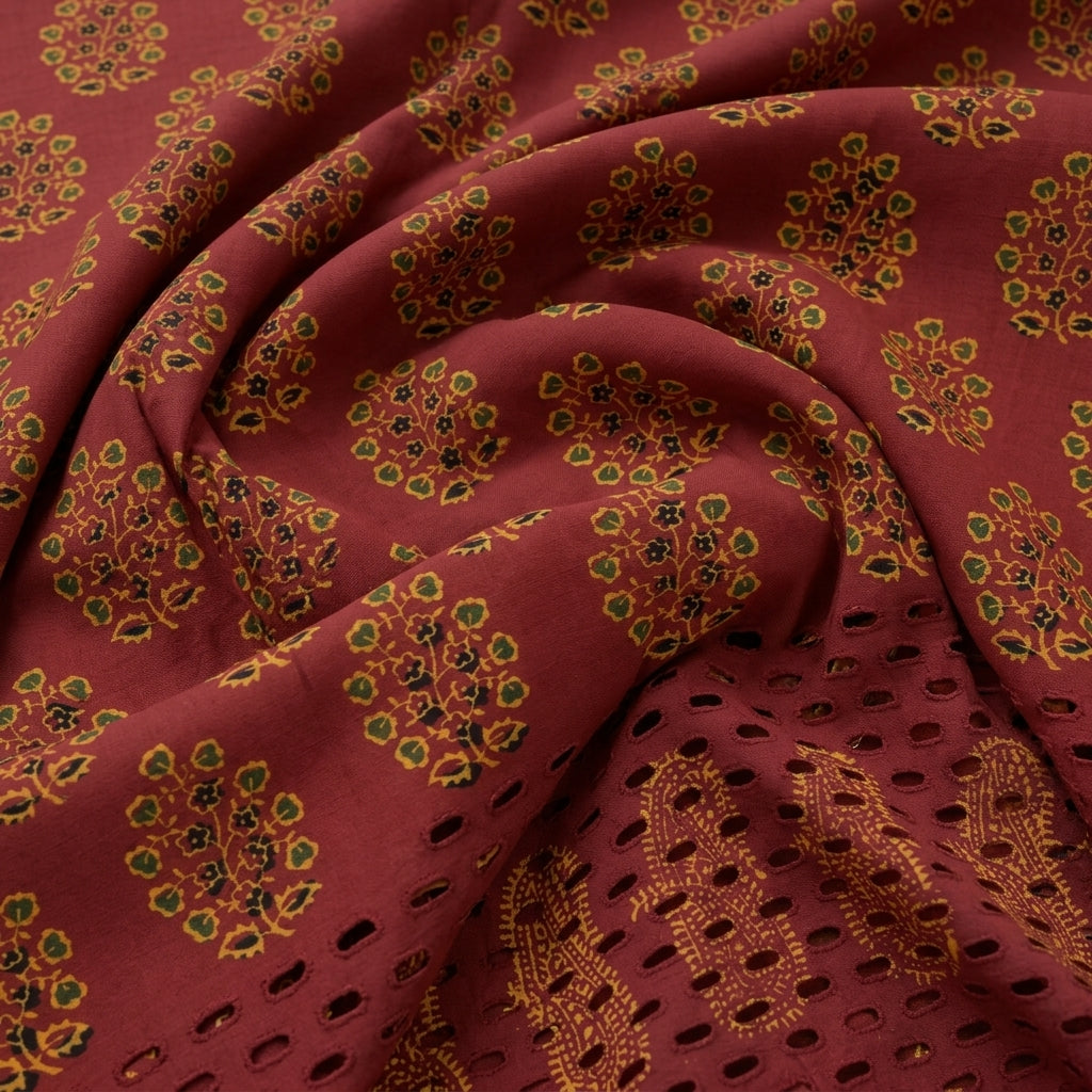 Swirled Cutwork Maroon Cutwork Cotton Fabric