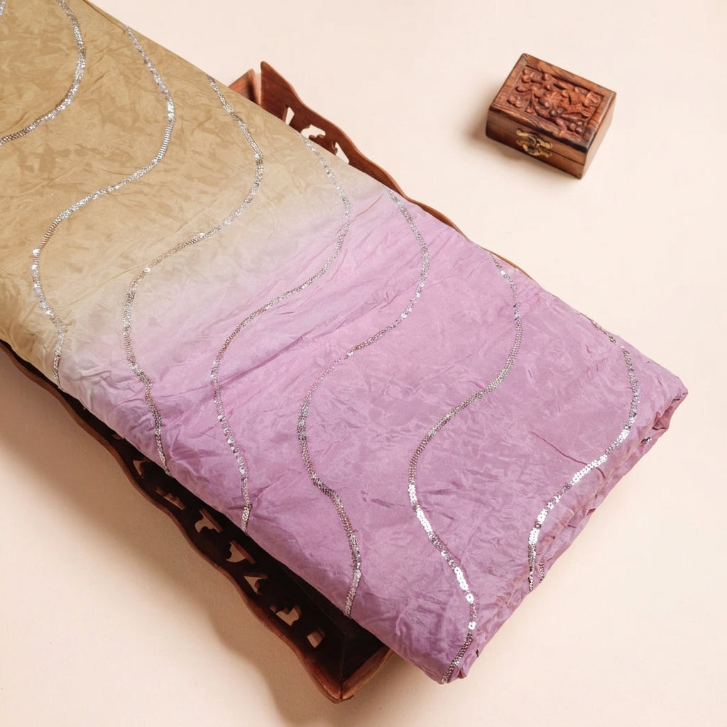 Two Toned Pink Yellow Two Toned Crepe Fabric on a wooden tray