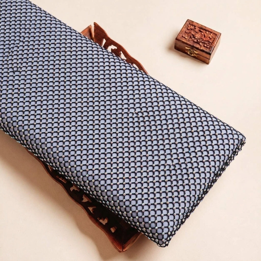 Folded Black Embroidery Net Fabric Highlighting Stone and Texture