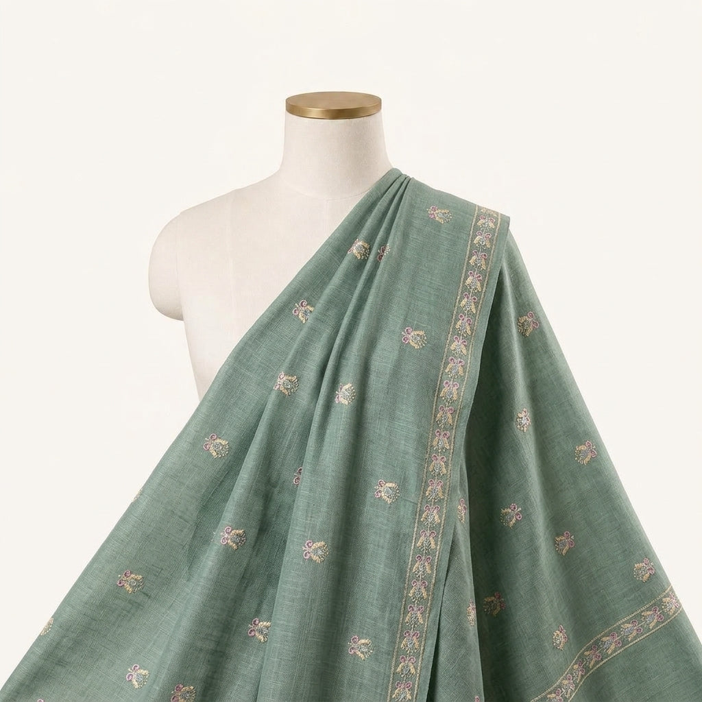 Embroidery Green Embroidery Linen Fabric Draped as a saree