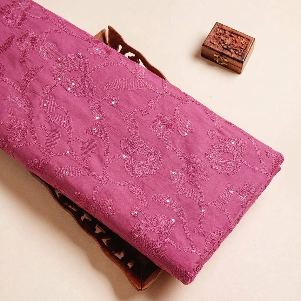 Folded Pink Embroidery Tussar Fabric Highlighting Silk Thread Work Sequin and Texture