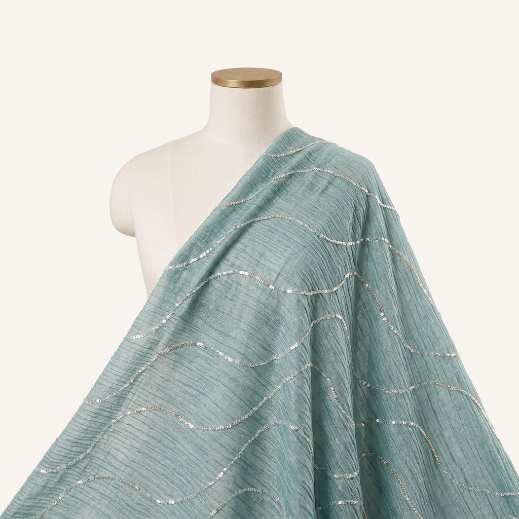 Embroidery Dark Green Embroidery Tissue Fabric Draped as a saree