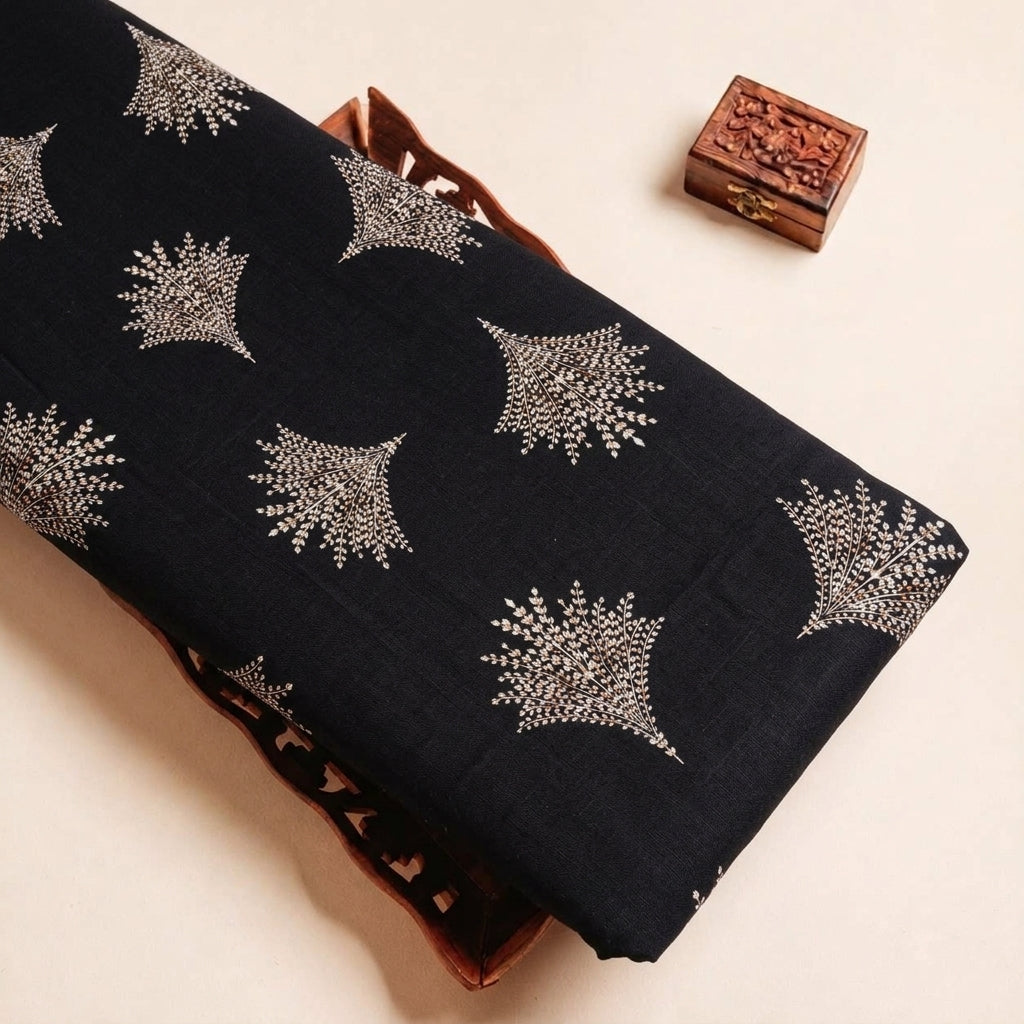Folded Black Floral Rayon Fabric Highlighting and Texture