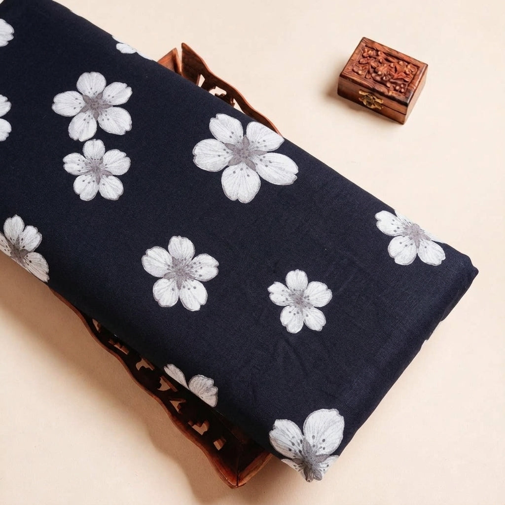Folded Black Floral Rayon Fabric Highlighting and Texture