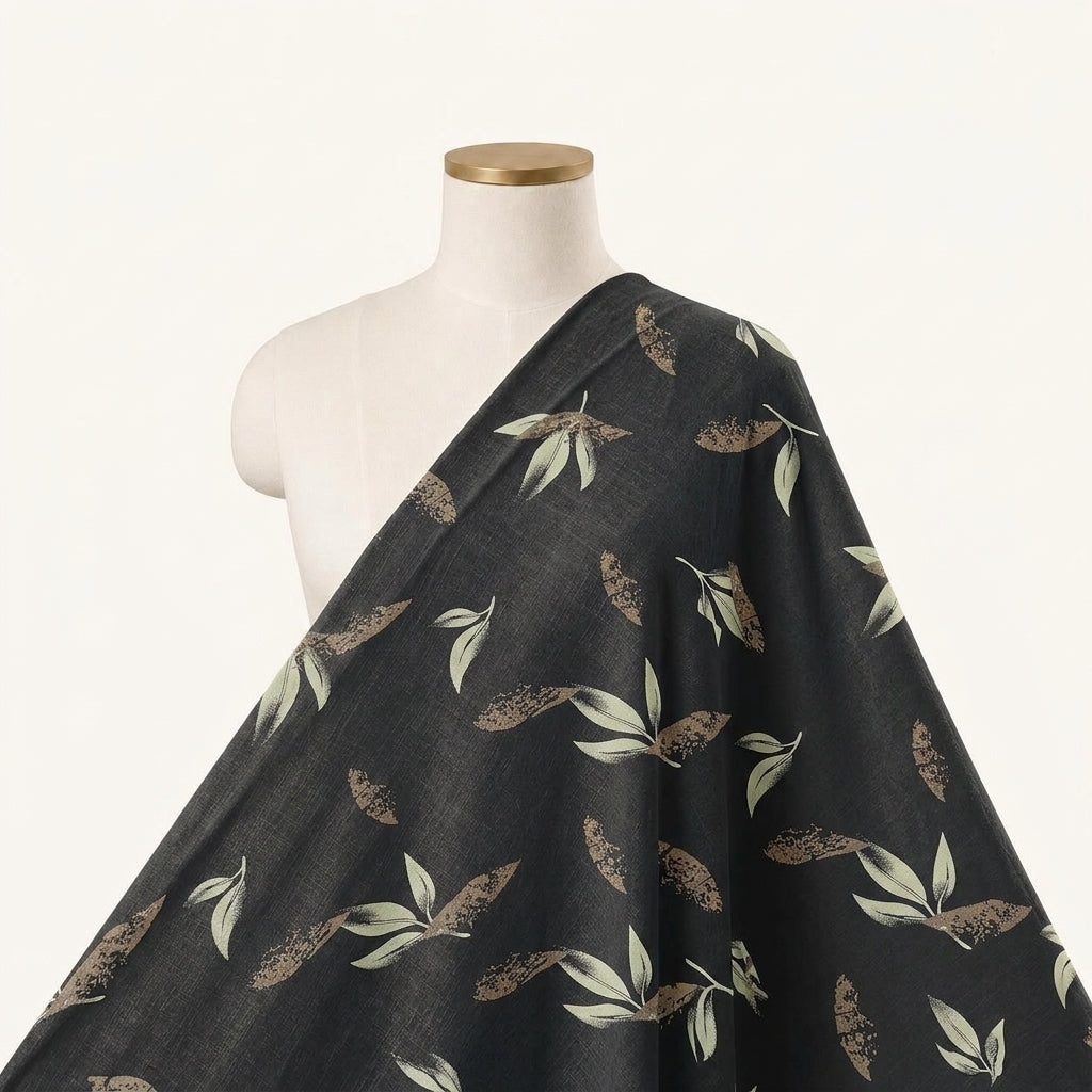 Leaf Black Leaf Rayon Fabric Draped as a saree