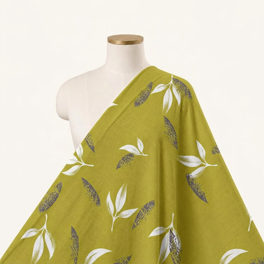 Leaf Green Leaf Rayon Fabric Draped as a saree