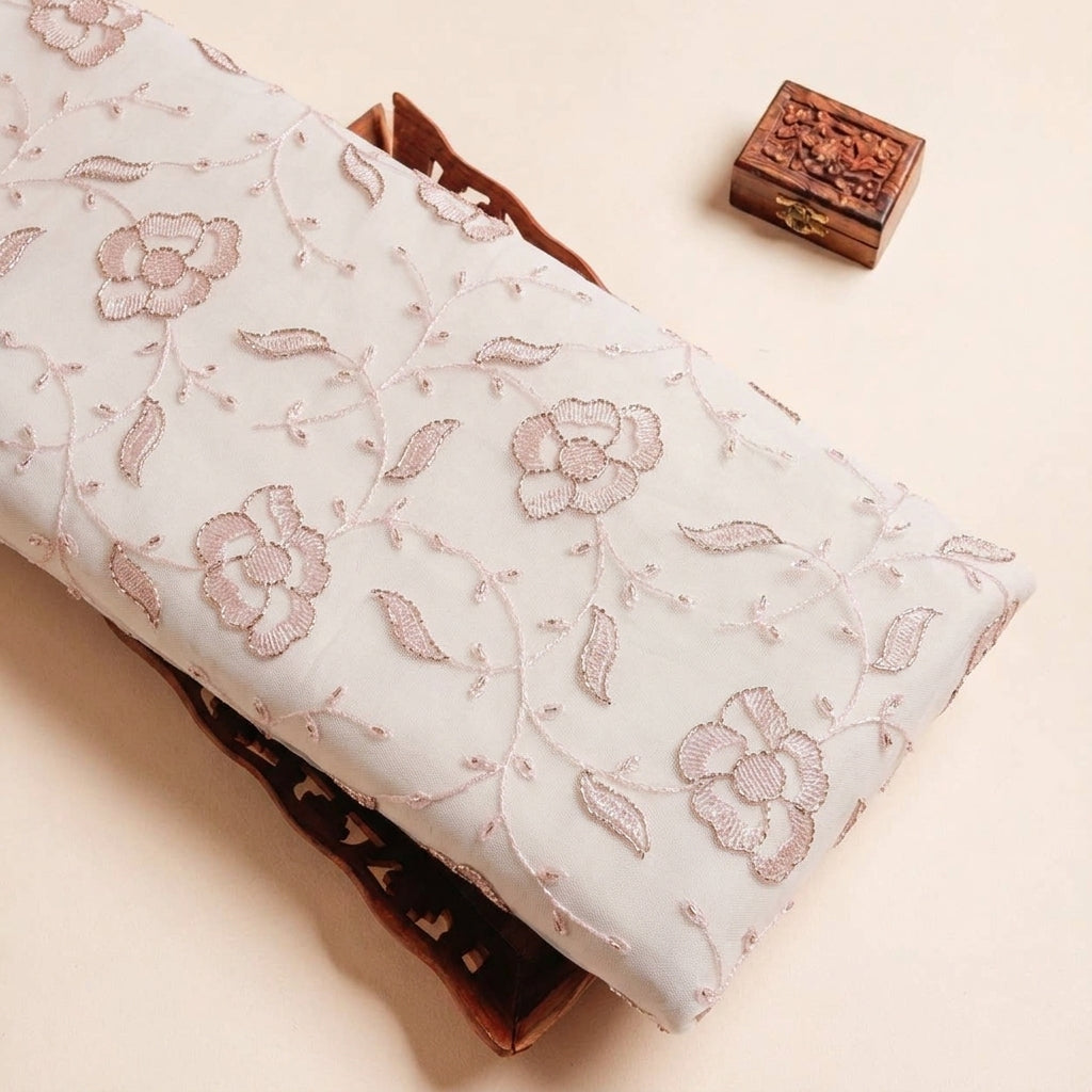 Folded Light Pink Embroidery Net Fabric Highlighting Floral Stone and Texture
