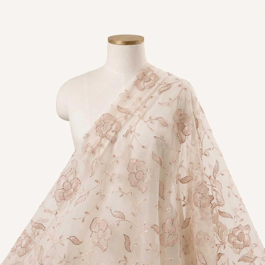 Embroidery Peach Embroidery Net Fabric Draped as a saree
