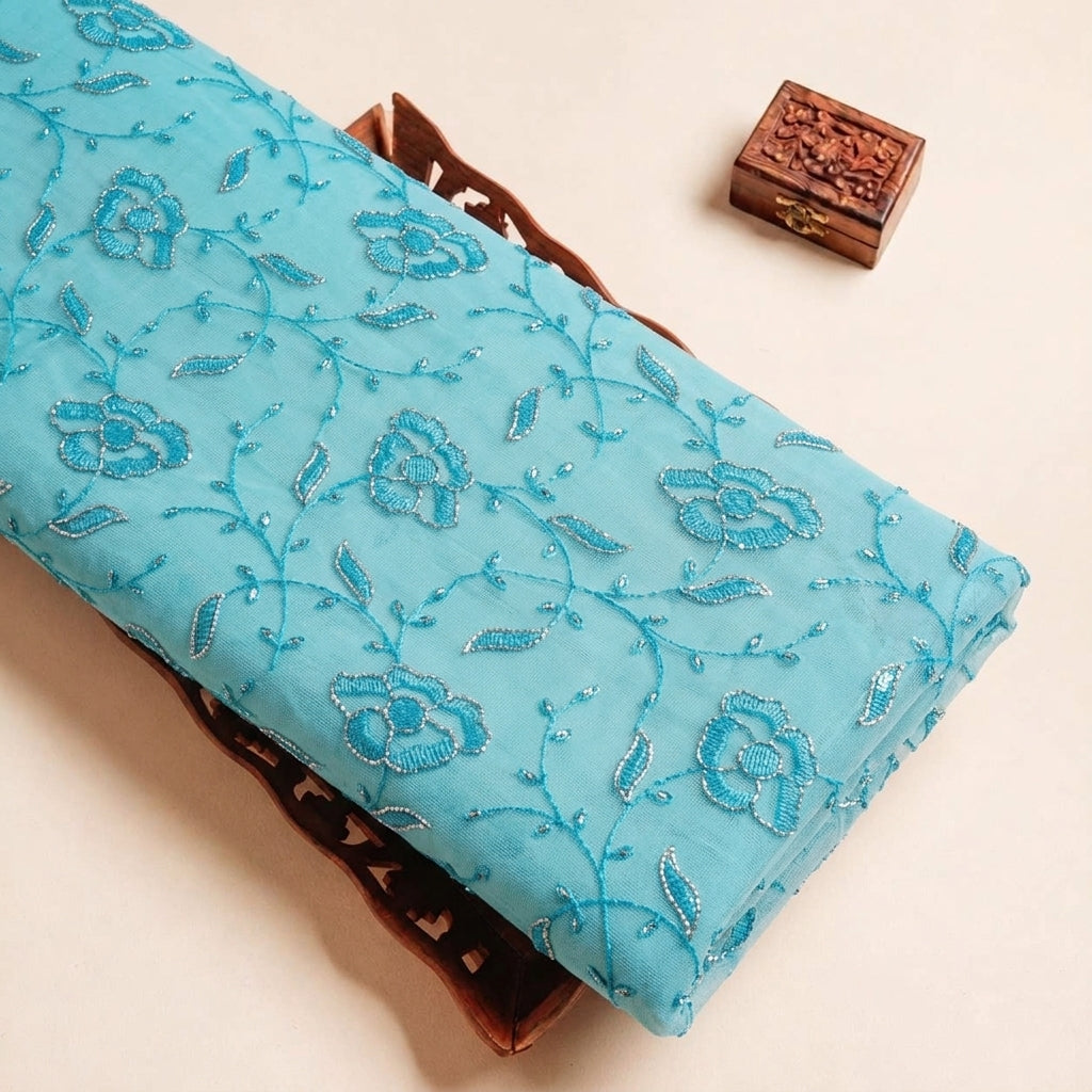 Folded Blue Embroidery Net Fabric Highlighting and Texture