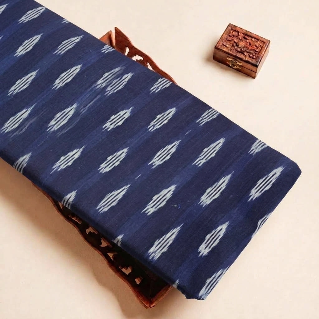 Folded Indigo Ikat Cotton Fabric Highlighting and Texture