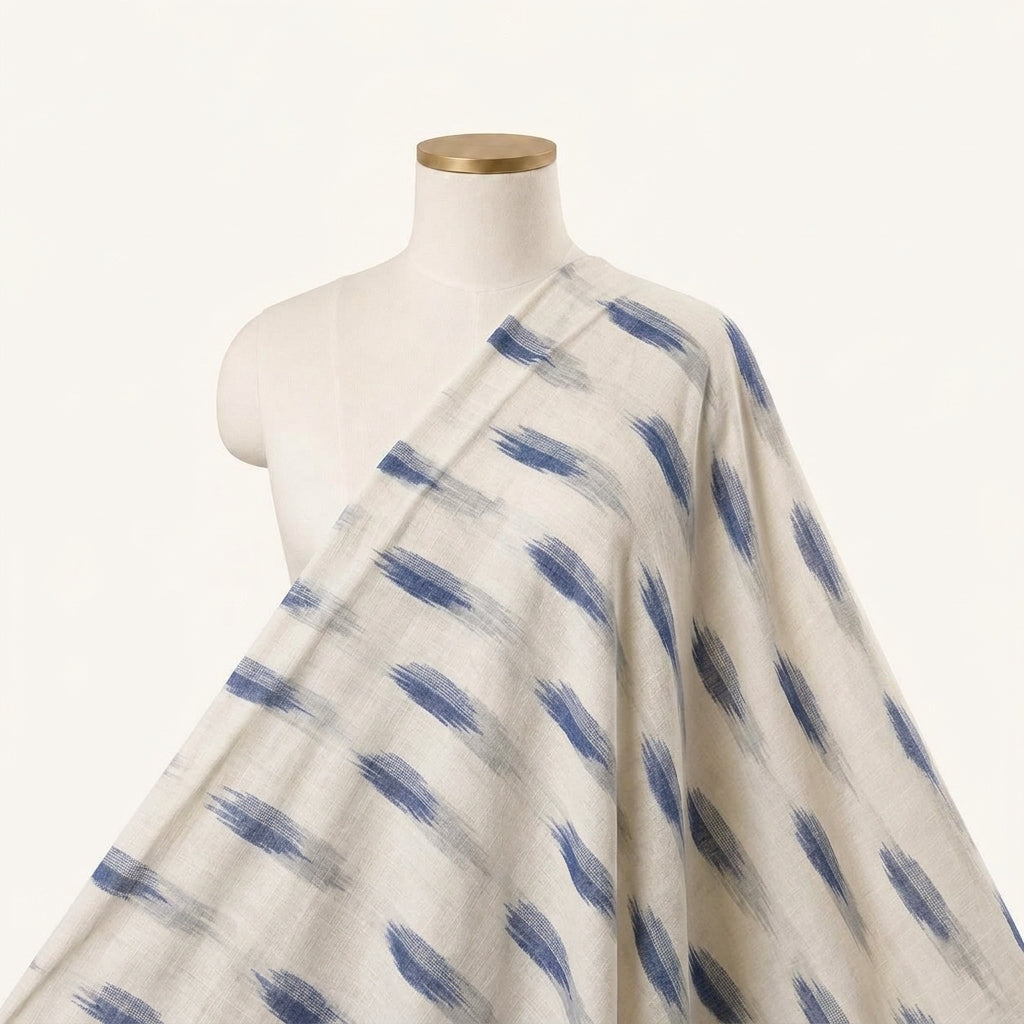 Ikat White Ikat Cotton Fabric Draped as a saree