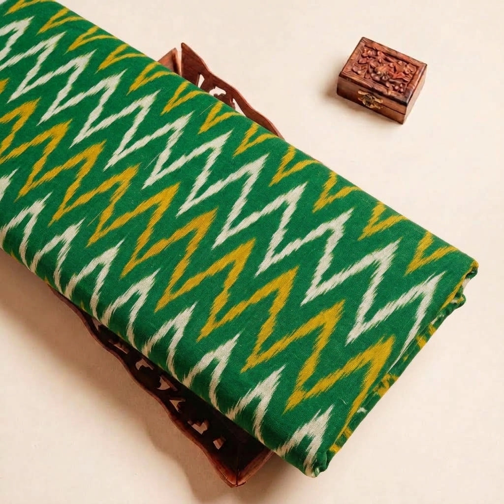 Folded Green Ikat Cotton Fabric Highlighting and Texture