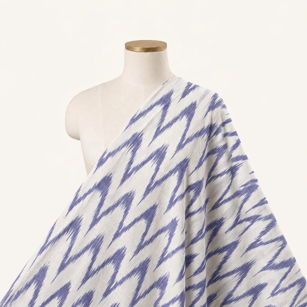 Ikat White Ikat Cotton Fabric Draped as a saree