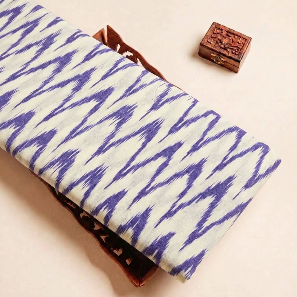 Folded White Ikat Cotton Fabric Highlighting and Texture