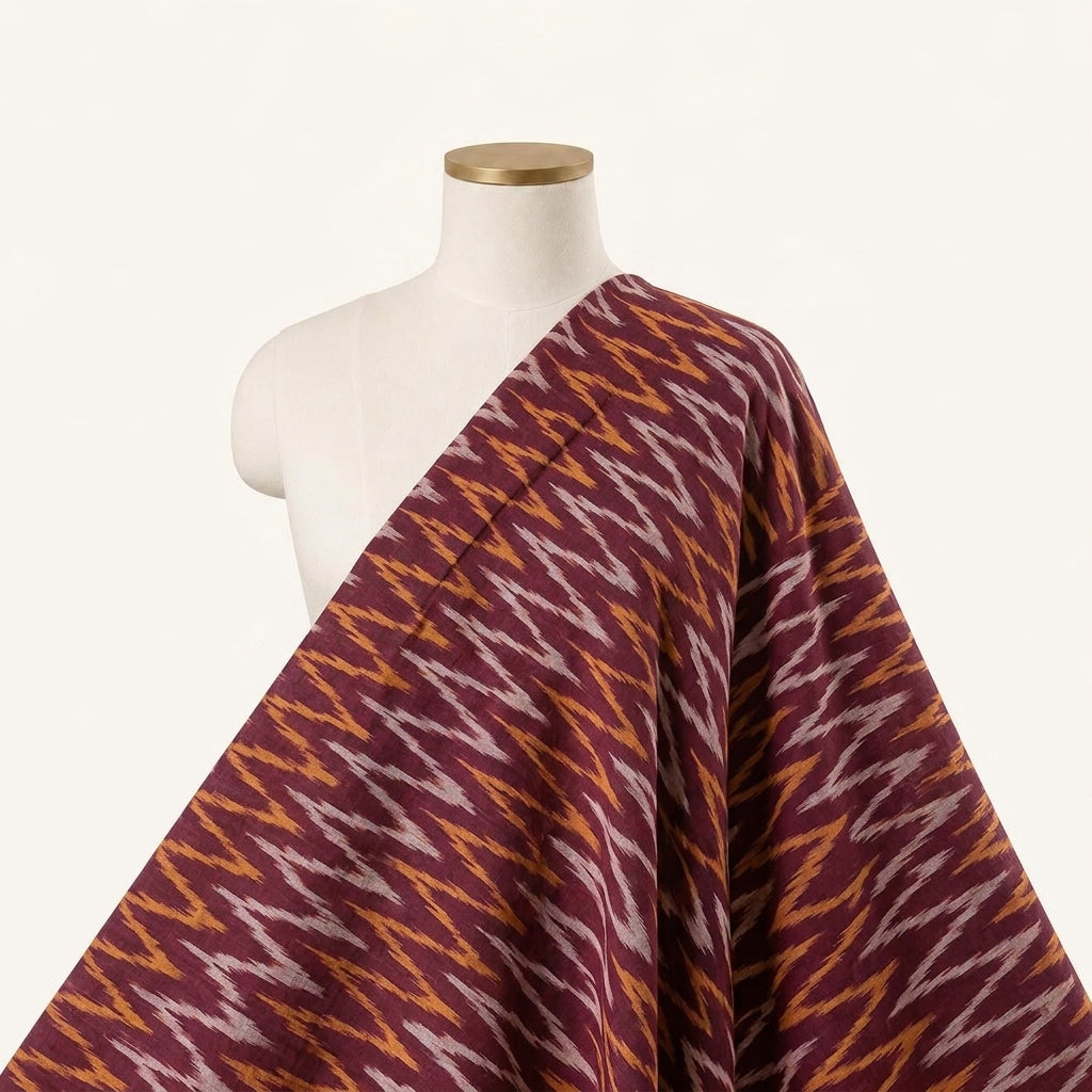 Ikat Wine Ikat Cotton Fabric Draped as a saree