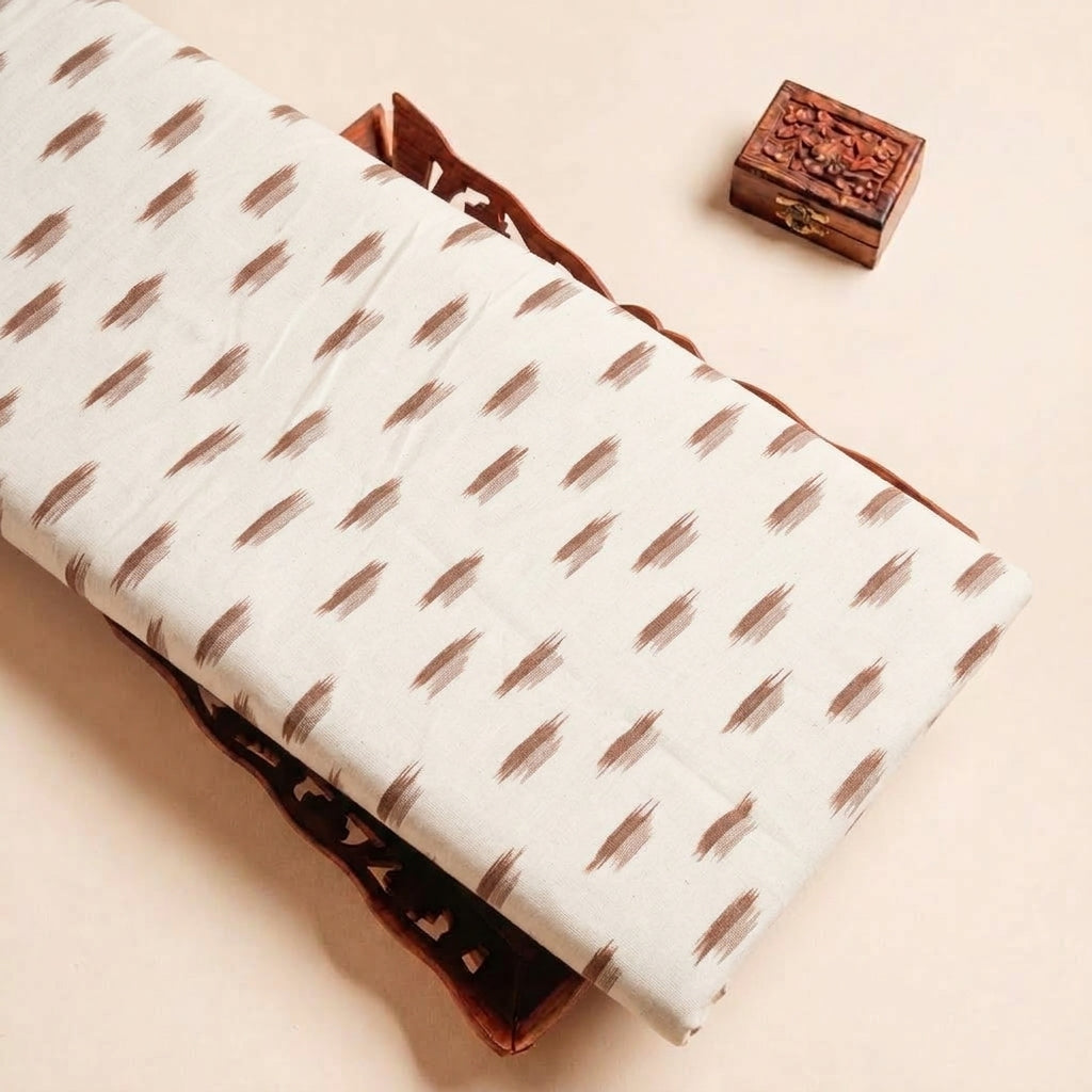 Folded Off White Ikat Cotton Fabric Highlighting and Texture