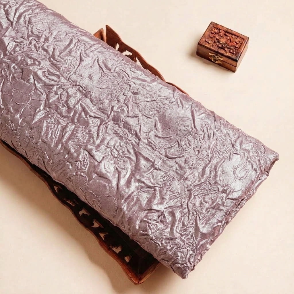 Folded Mauve Embossed Foil Floral Crepe Fabric Highlighting Crushed and Texture