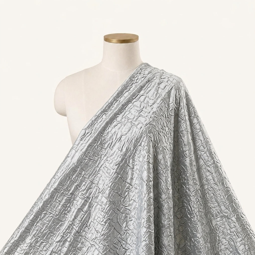 Embossed Foil Blue Embossed Foil Crepe Fabric Draped as a saree