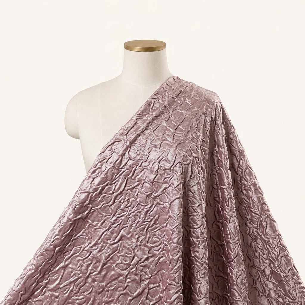 Embossed Foil Dusty Pink Embossed Foil Crepe Fabric Draped as a saree