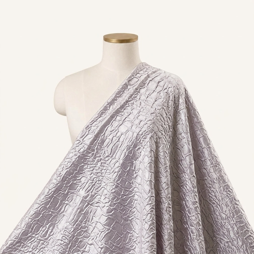Embossed Foil Violet Embossed Foil Crepe Fabric Draped as a saree