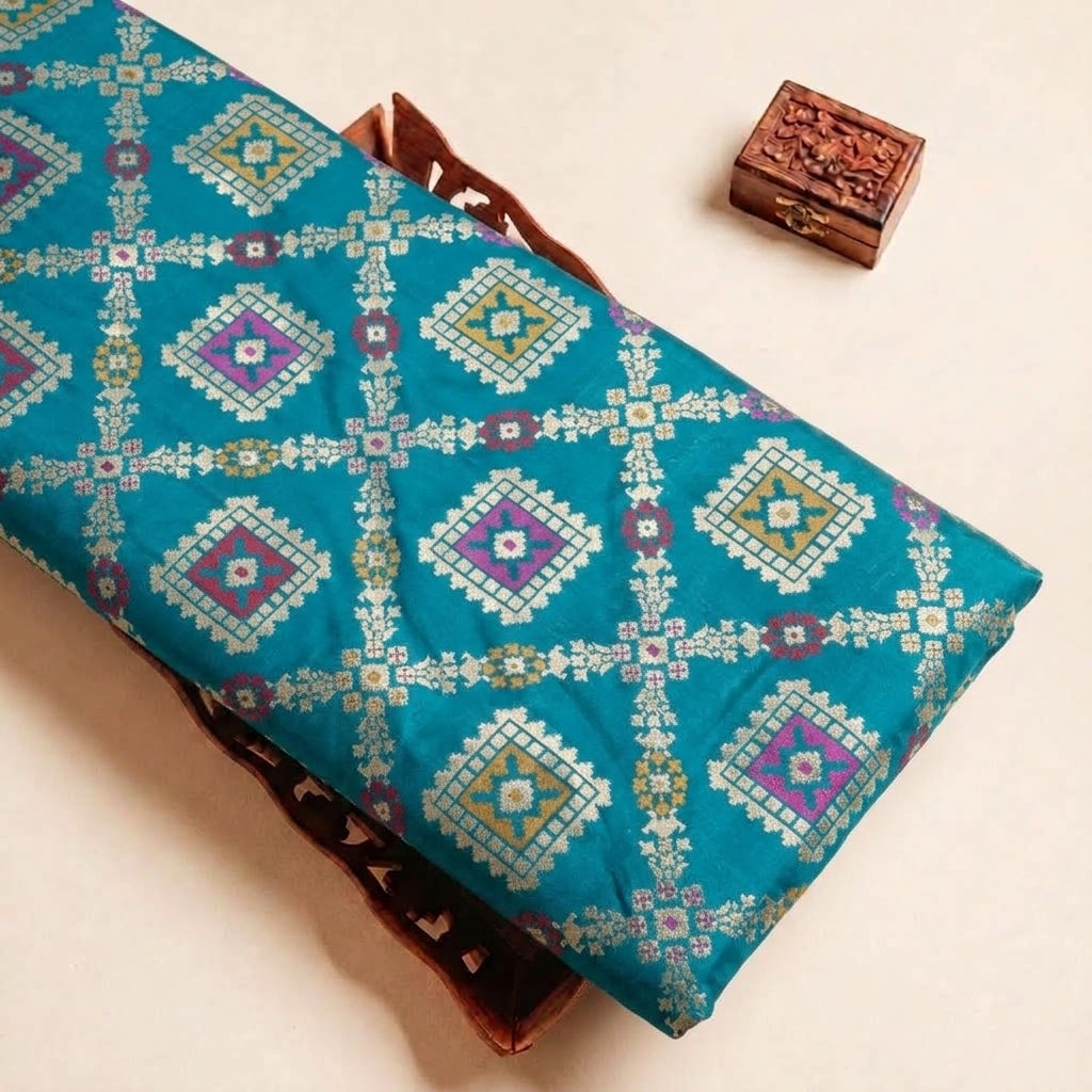 Folded Sea Blue Patola Banaras Fabric Highlighting Abstract and Texture