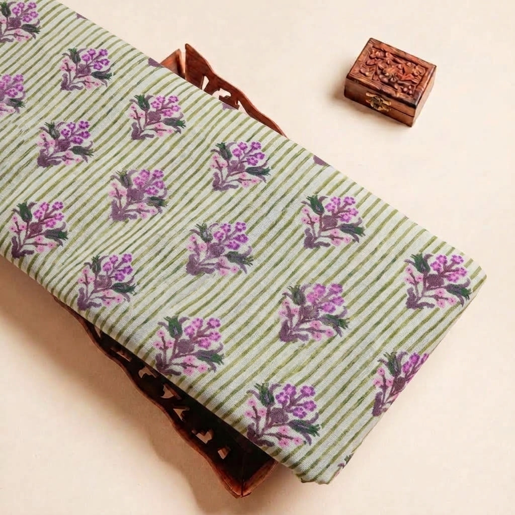 Folded Green Floral Linen Fabric Highlighting Stripes and Texture