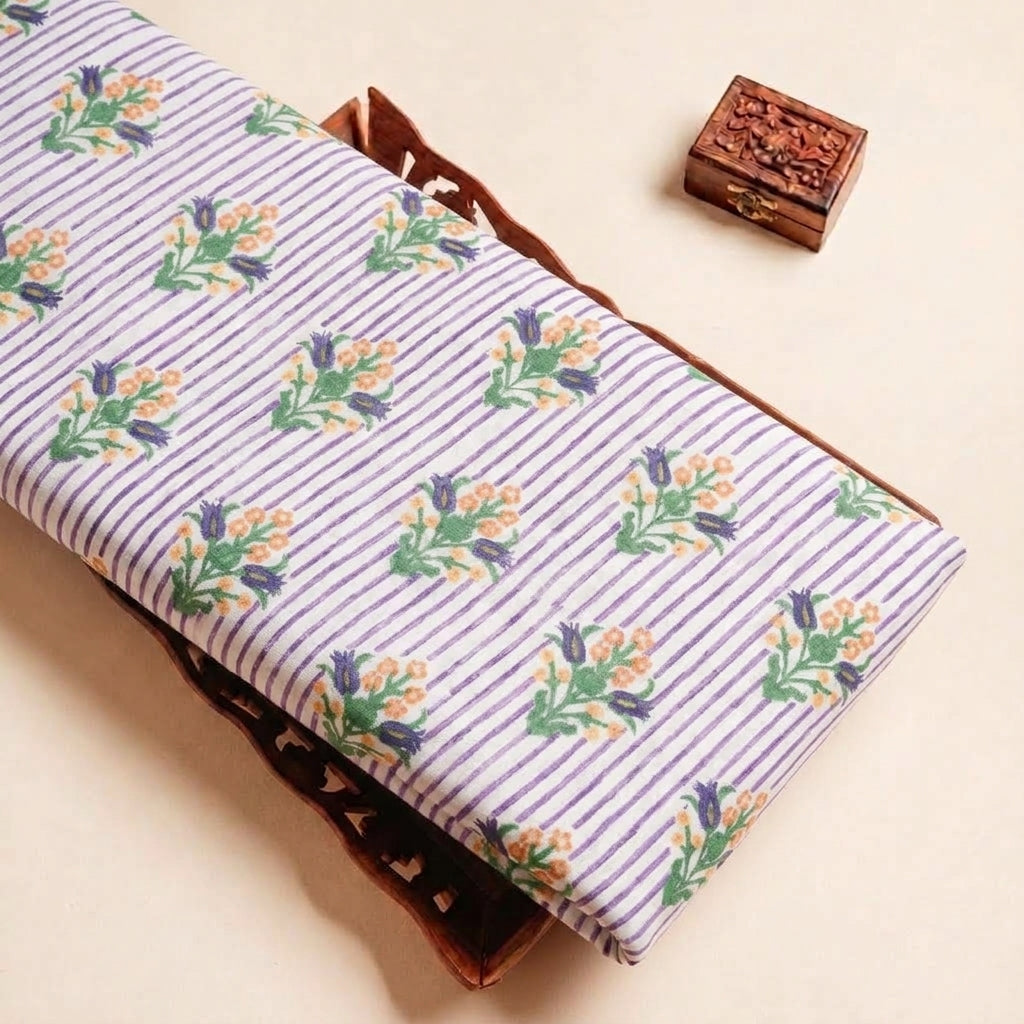 Folded Purple Floral Linen Fabric Highlighting Stripes and Texture