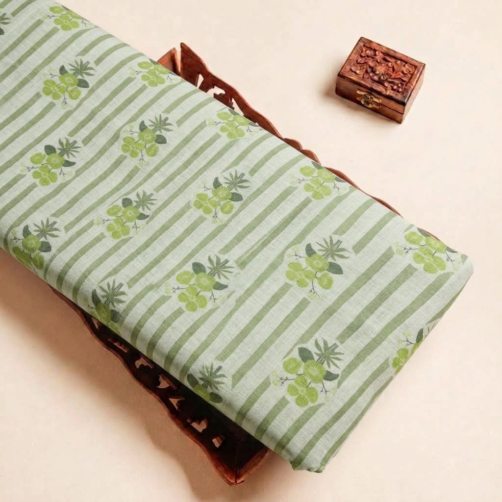 Folded Green Floral Linen Fabric Highlighting Stripes and Texture