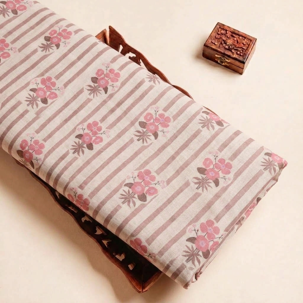 Folded Pink Floral Linen Fabric Highlighting Stripes and Texture