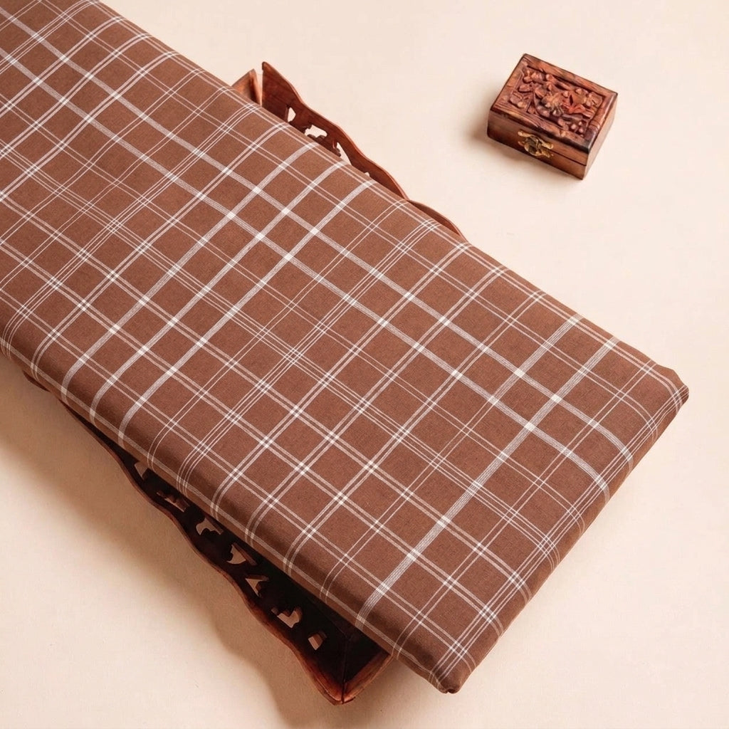 Folded Brown Checked Cotton Fabric Highlighting Texture