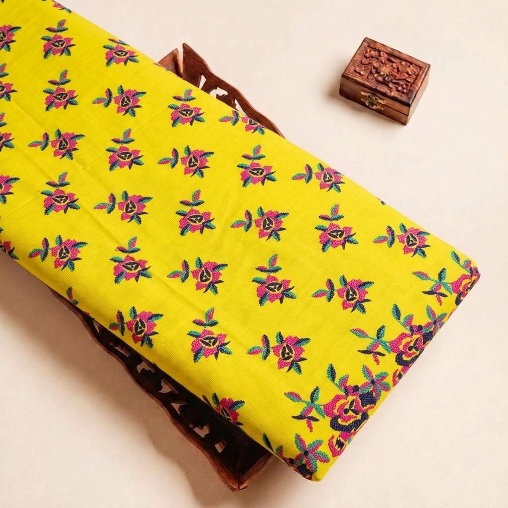 Folded Yellow Embroidery Cotton Fabric Highlighting Floral Thread Work and Texture