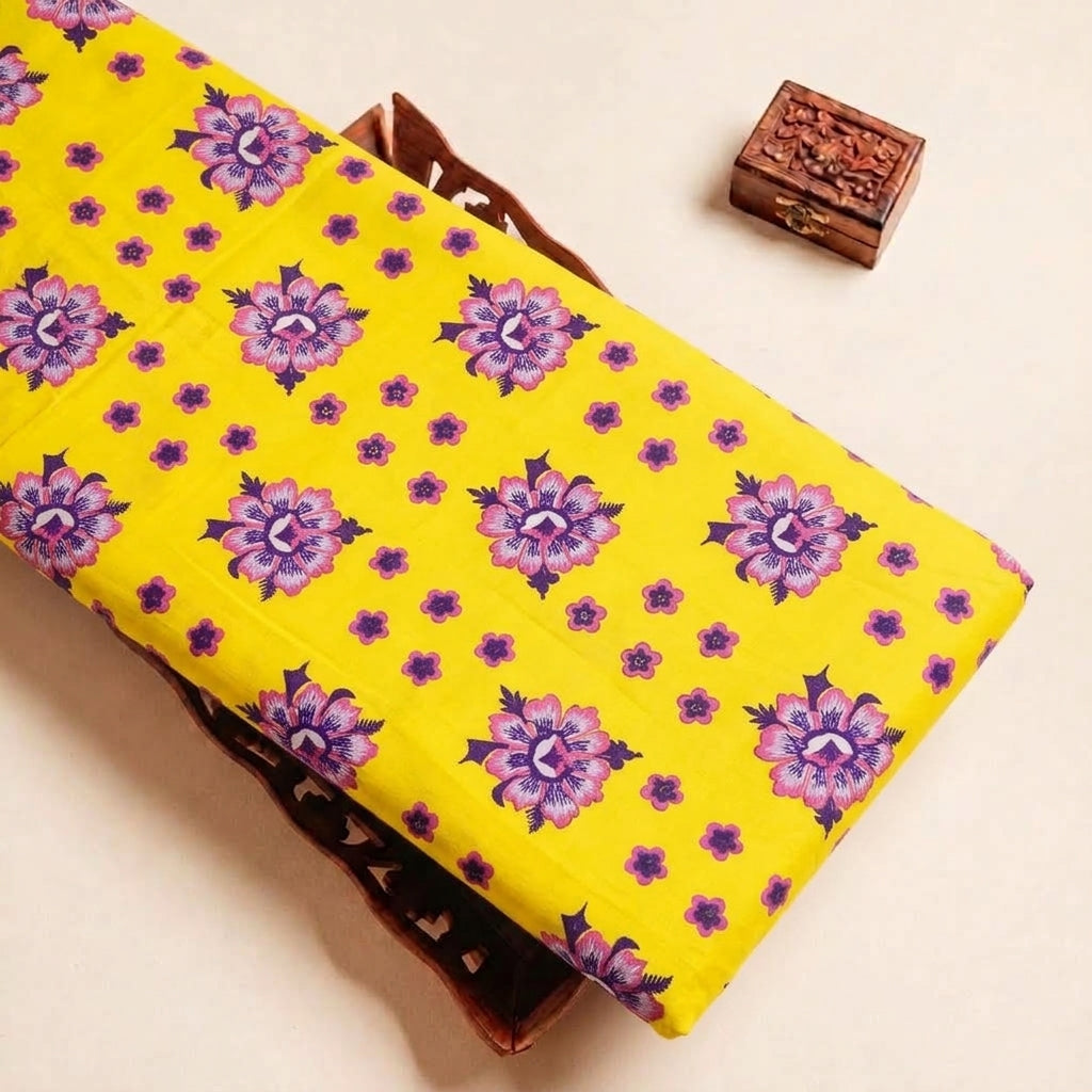 Folded Yellow Embroidery Cotton Fabric Highlighting Floral Thread Work and Texture
