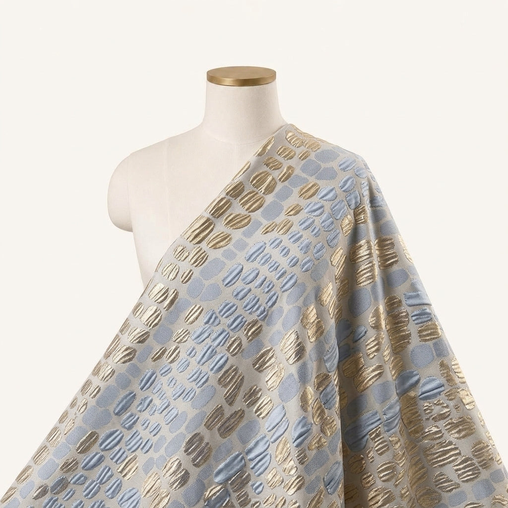 Embossed Blue Gold Embossed Organza Fabric Draped as a saree