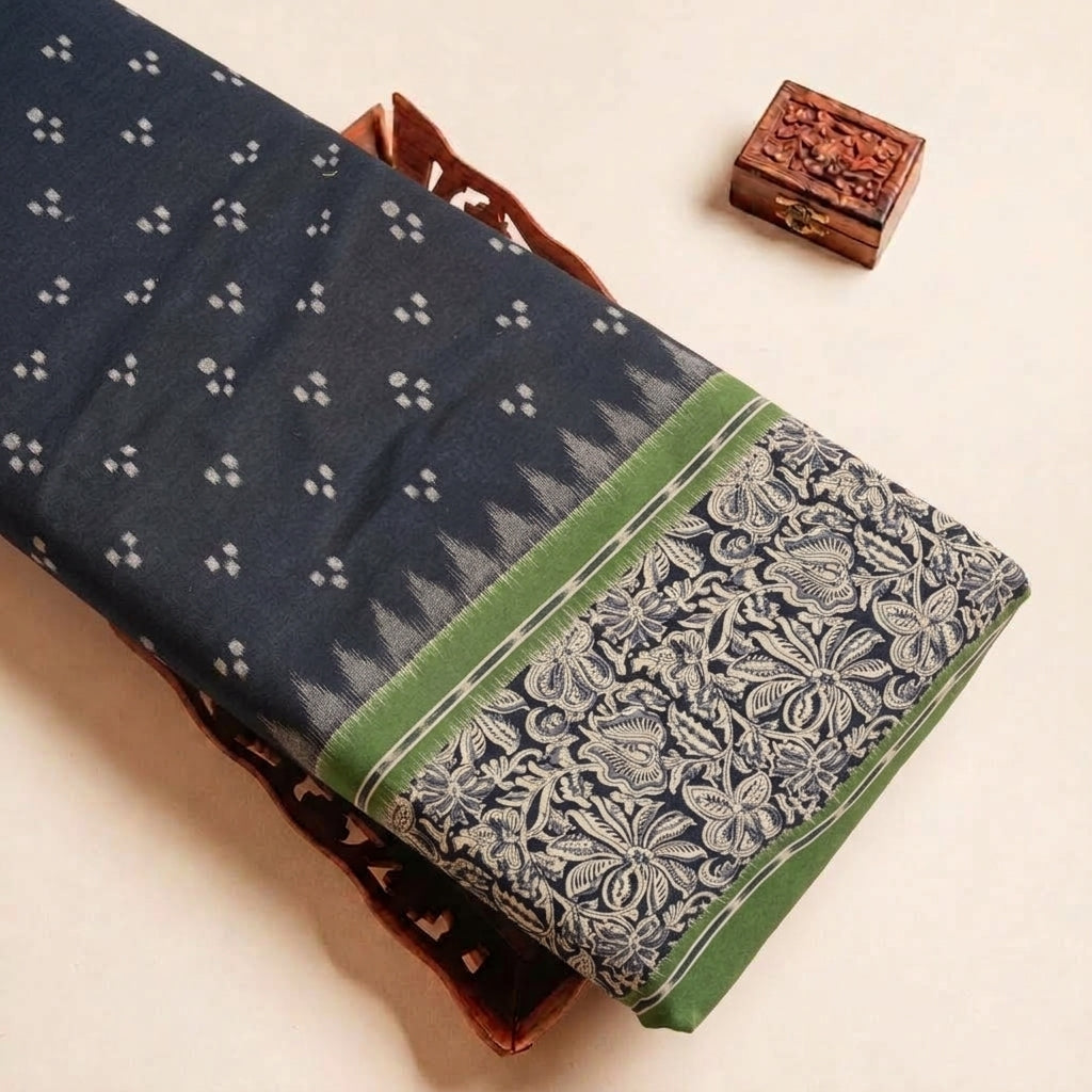 Folded Black Ikat Cotton Fabric Highlighting Border Floral and Texture