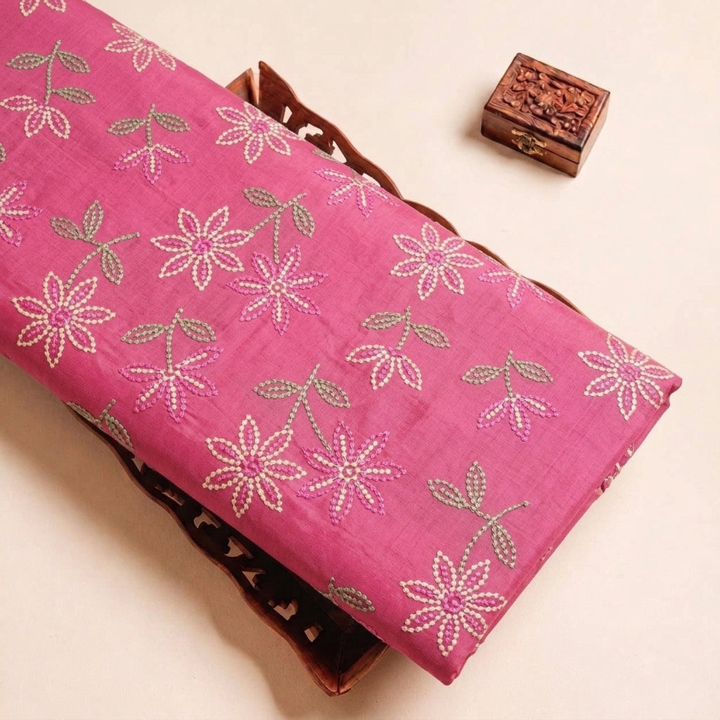 Folded Pink Embroidery Cotton Fabric Highlighting Thread Work Floral and Texture