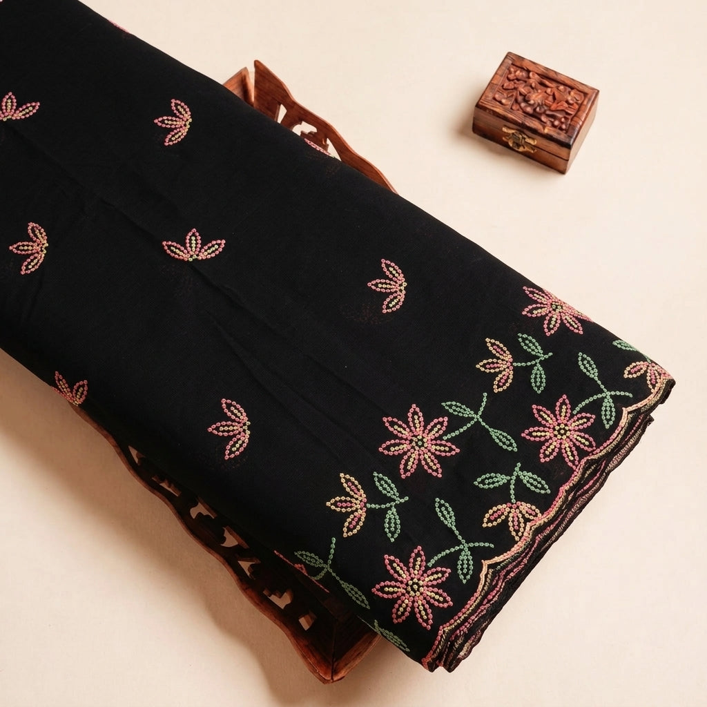 Folded Black Embroidery Cotton Fabric Highlighting Border Floral and Texture