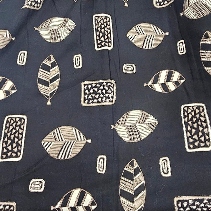 Black Leaf Rayon Fabric, laid flat