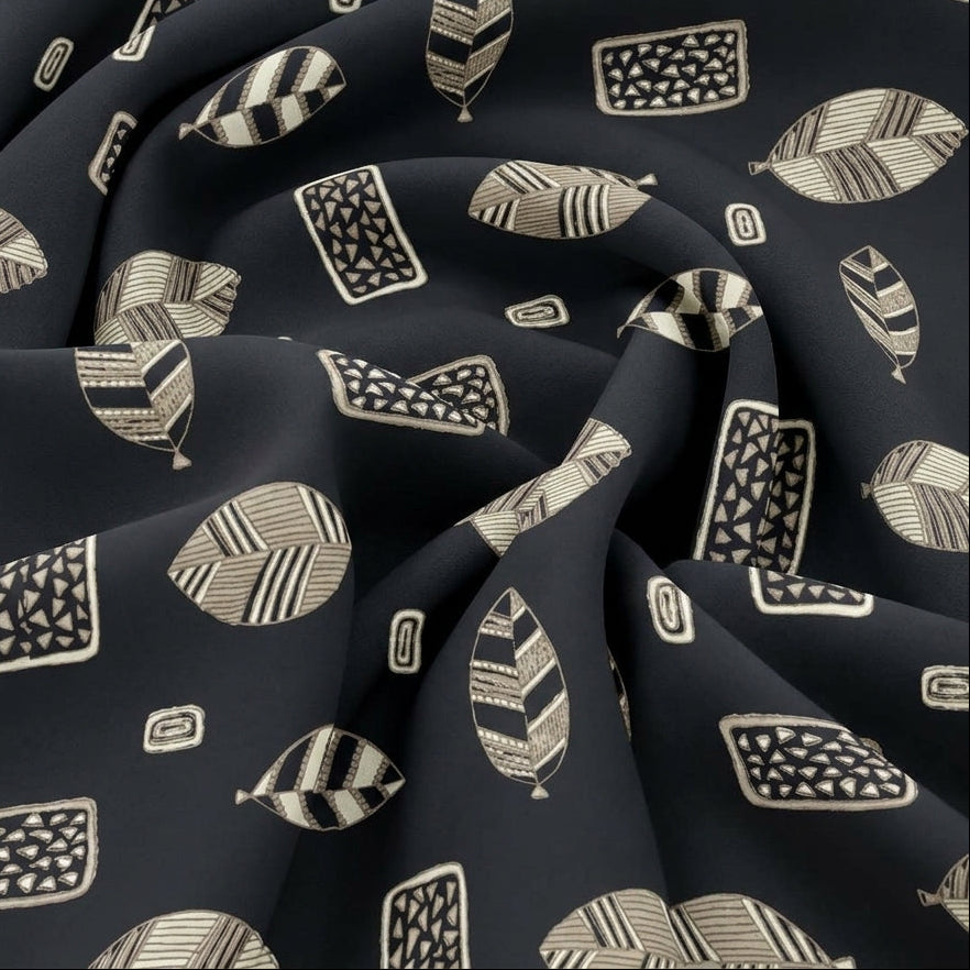 Swirled Black Leaf Rayon Fabric Showing Drape