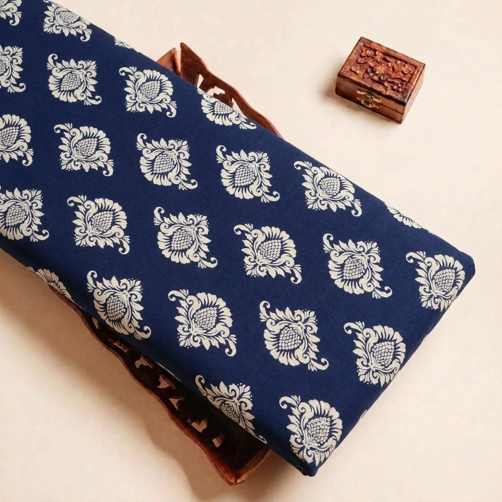 Folded Dark Blue Floral Rayon Fabric Highlighting Texture