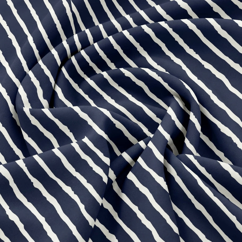 Dark Blue Stripes Rayon Fabric, swirled to show the drape