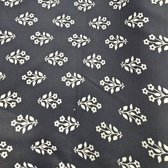 Black Floral Rayon Fabric, laid flat