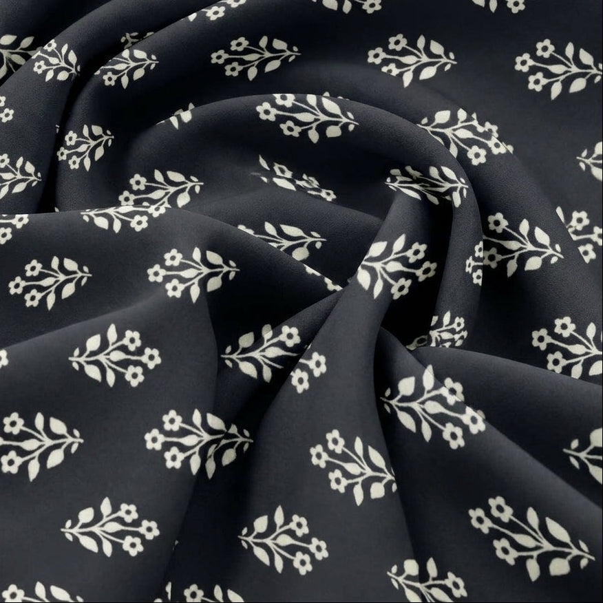 Black Floral Rayon Fabric, swirled to show the drape