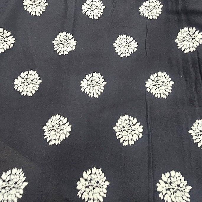 Black Floral Rayon Fabric, laid flat