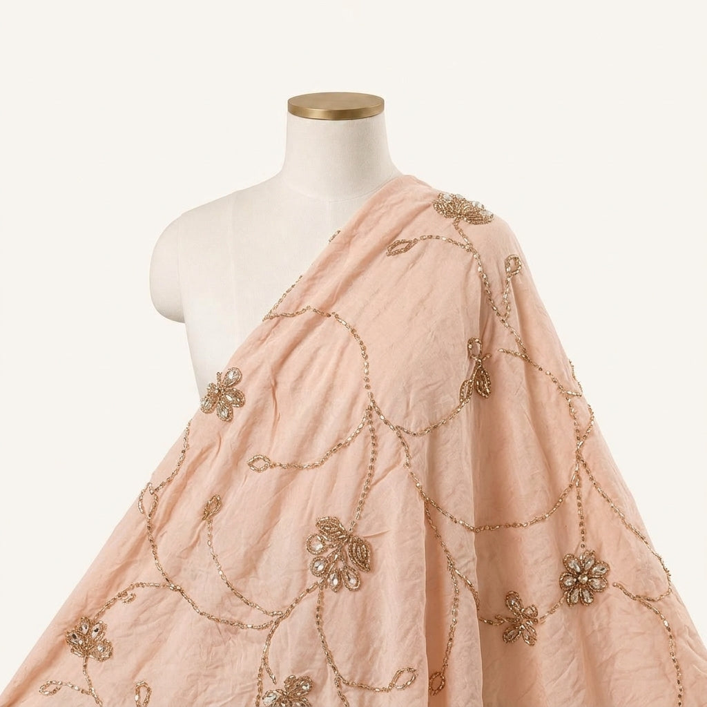 Baby Pink Embroidery Organza Fabric Draped as a saree