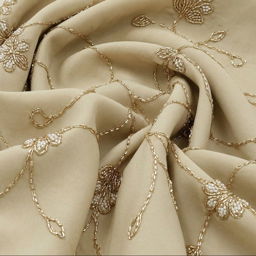 Beige Embroidery Organza Fabric, swirled to show the drape